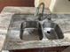 Double sink with updated faucet and stone countertops at 1079 S Hiawassee Rd # 1121, Orlando, FL 32835