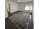 Spacious bedroom with fresh paint and a large rug at 111 E 8Th St, Sanford, FL 32771