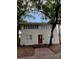 Charming two-story home with classic architecture and mature trees in a desirable neighborhood at 111 E 8Th St, Sanford, FL 32771