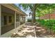 Screened-in patio with brick-paved walkway and privacy fence offering a tranquil space for outdoor enjoyment at 1156 Brandy Lake View Cir, Winter Garden, FL 34787