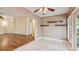 Dining area features ceramic tile flooring and sliding glass doors that lead to the screened in patio at 1156 Brandy Lake View Cir, Winter Garden, FL 34787