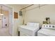 Well-equipped laundry room next to entry to house at 1156 Brandy Lake View Cir, Winter Garden, FL 34787
