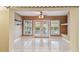 Bright sunroom with tile floor, ceiling fan and glass doors leading to the outside patio at 1156 Brandy Lake View Cir, Winter Garden, FL 34787