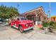 Vintage firetruck parked in front of the Winter Garden historic building at 1156 Brandy Lake View Cir, Winter Garden, FL 34787