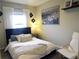 Bright bedroom featuring a comfortable bed, soft textures, and a calming atmosphere, perfect for rest and relaxation at 11746 Water Run Aly, Windermere, FL 34786