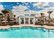 Community pool with a clubhouse and outdoor seating areas, great for recreation at 11746 Water Run Aly, Windermere, FL 34786