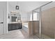Bathroom features a soaking tub, glass enclosed shower, and double vanity at 119 Argyle Gate Loop Rd, Dundee, FL 33838