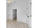 Bright bedroom featuring tiled floors and two closets at 119 Argyle Gate Loop Rd, Dundee, FL 33838