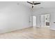 Spacious bedroom features an ensuite bathroom, multiple closets, and tile flooring at 119 Argyle Gate Loop Rd, Dundee, FL 33838
