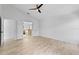 Large bedroom with high ceilings, tile floors, ensuite bath, and a ceiling fan for added comfort at 119 Argyle Gate Loop Rd, Dundee, FL 33838