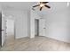 This bedroom has a ceiling fan, and a closet, with tile flooring at 119 Argyle Gate Loop Rd, Dundee, FL 33838