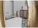 An open concept living space featuring designer accents, decor, and lighting at 119 Argyle Gate Loop Rd, Dundee, FL 33838