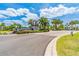 Isles of Lake Nona community entrance features beautiful landscaping, fountains, and decorative stonework at 13864 Destin Beach Ln, Orlando, FL 32827