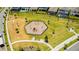 Aerial view of the community playground and surrounding green spaces at 13864 Destin Beach Ln, Orlando, FL 32827