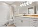 Bathroom featuring a tub with shower, white vanity with countertop, and an oversized mirror at 14841 Faversham Cir, Orlando, FL 32826