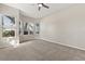 Spacious bedroom with neutral carpet and large windows, creating a serene atmosphere at 14841 Faversham Cir, Orlando, FL 32826