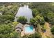 Aerial view of the community pool with a lake view at 14841 Faversham Cir, Orlando, FL 32826