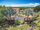 Welcome to High Grove, a beautiful community with a decorative entrance and lush landscaping at 16604 Caribbean Breeze Way, Clermont, FL 34714