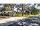 Glenn Burns Community Building with well-maintained lawn and gazebo in Montverde at 17409 Division St, Montverde, FL 34756