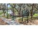 Kirk Park in Montverde featuring playground and sign for ball field and walking trail at 17409 Division St, Montverde, FL 34756