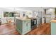 Well-lit kitchen featuring butcher block island and stainless steel appliances at 17409 Division St, Montverde, FL 34756