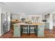 Bright kitchen featuring butcher block island, stainless steel appliances, and open layout at 17409 Division St, Montverde, FL 34756