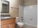 This bathroom offers tile floors, granite countertops, and a shower-tub combo with bright white tile at 208 Afton Sq # 307, Altamonte Springs, FL 32714