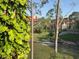 Scenic view of residential buildings with lush greenery and mature trees surrounding the property at 208 Afton Sq # 307, Altamonte Springs, FL 32714