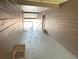 Inviting hallway with wood paneling, leading to an open area perfect for relaxing at 208 Afton Sq # 307, Altamonte Springs, FL 32714