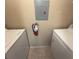 Bright laundry area includes a washing machine, dryer and a wall-mounted fire extinguisher at 208 Afton Sq # 307, Altamonte Springs, FL 32714