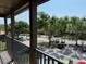 Balcony view of parking area with lush greenery at 224 Afton Sq # 301, Altamonte Springs, FL 32714