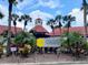 Elegant community sign with lush tropical landscaping at Oasis at Pearl Lake at 224 Afton Sq # 301, Altamonte Springs, FL 32714