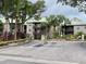 Multi-story building with lush landscaping and a secure gated entrance at 224 Afton Sq # 301, Altamonte Springs, FL 32714