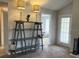 Cozy living room with decorative shelving, fireplace, and neutral decor at 224 Afton Sq # 301, Altamonte Springs, FL 32714