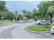 Easy access with an expansive view of the parking area and well-manicured landscaping surrounding the property at 224 Afton Sq # 301, Altamonte Springs, FL 32714