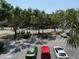 A view of the expansive parking lot, surrounded by trees and landscaping, ensuring convenient parking at 224 Afton Sq # 301, Altamonte Springs, FL 32714