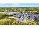 Sweeping aerial view of the community, showcasing well-maintained homes and lush green surroundings at 2264 Emerald Springs Dr, Apopka, FL 32712