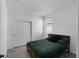 Cozy bedroom with closet, window, and bed with decorative pillow at 2264 Emerald Springs Dr, Apopka, FL 32712