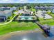Aerial view of the community pool and lake featuring lush surroundings at 2264 Emerald Springs Dr, Apopka, FL 32712
