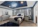 Luxurious main bedroom featuring a decorative ceiling, elegant furniture, and stylish decor at 2264 Emerald Springs Dr, Apopka, FL 32712