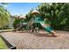 Well-maintained community playground with slides, climbing structures, and shaded areas for enjoyment at 2264 Emerald Springs Dr, Apopka, FL 32712