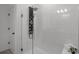 Modern, tiled shower with a glass door and rainfall shower head at 2264 Emerald Springs Dr, Apopka, FL 32712