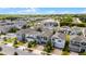 Street view showcasing houses near a lake featuring well-maintained landscaping and modern architecture at 2264 Emerald Springs Dr, Apopka, FL 32712