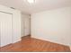 The bedroom has a closet and wood floors, offering practicality and style at 23 Old Sunbeam Dr, South Daytona, FL 32119