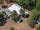 High-angle shot of the home featuring a shed and carport at 237 W Mcclendon St, Lady Lake, FL 32159