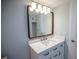 This vanity features updated lighting, drawers, and modern sink at 237 W Mcclendon St, Lady Lake, FL 32159