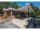 Brick home with a covered front entrance and driveway at 237 W Mcclendon St, Lady Lake, FL 32159