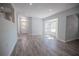 Spacious living room with bay windows, fresh paint, and recessed lighting at 237 W Mcclendon St, Lady Lake, FL 32159