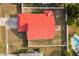 Bird's-eye view of the house featuring a bright red roof and well-maintained yard at 2426 Abbey Ave, Orlando, FL 32833