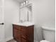 Cozy bathroom with modern fixtures, stylish vanity, and clean lines, offering a fresh and inviting space at 2426 Abbey Ave, Orlando, FL 32833